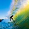 Surfer On Blue Ocean Wave