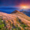 Colorful autumn sunrise in the Carpathian mountains. Pishkonya ridge, Ukraine, Europe.